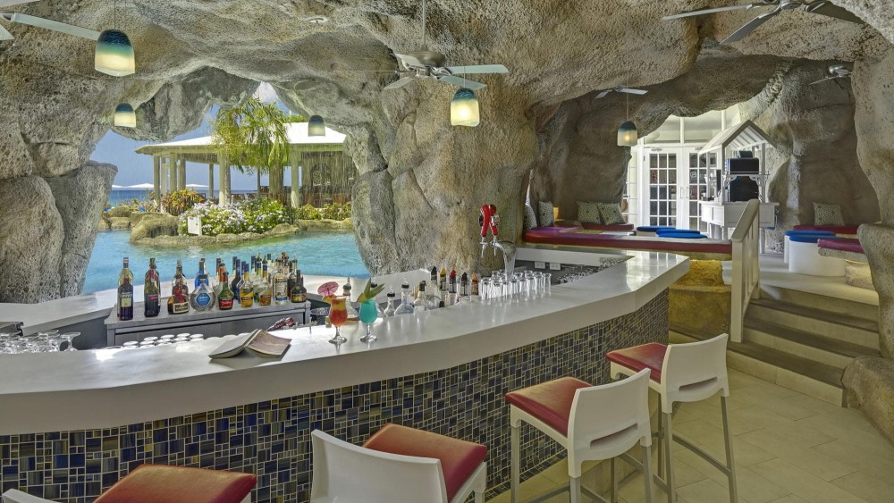 A bar inside a cave at Crystal Cove by Elegant Hotels