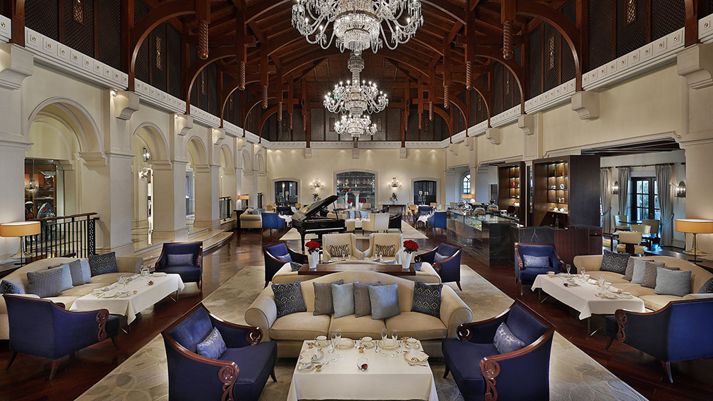 Lounges and chandelier in the Lobby Lounge at Ritz-Carlton Dubai