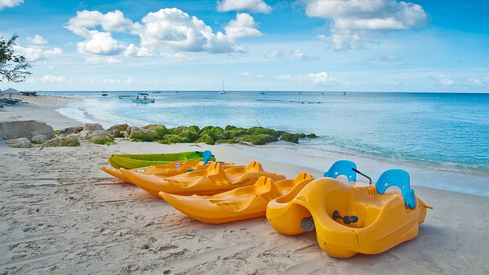 Watersports equipment on the beach at Mango Bay
