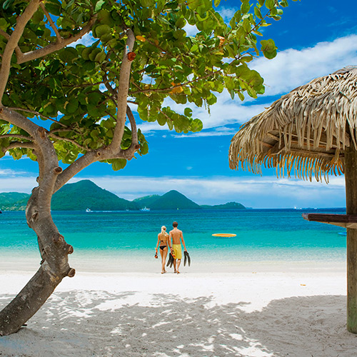 Couple on the beach at Sandals Grande St Lucian