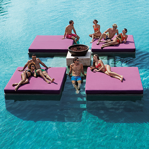 Friends on pontoons in the pool at Breathless Riviera Cancun