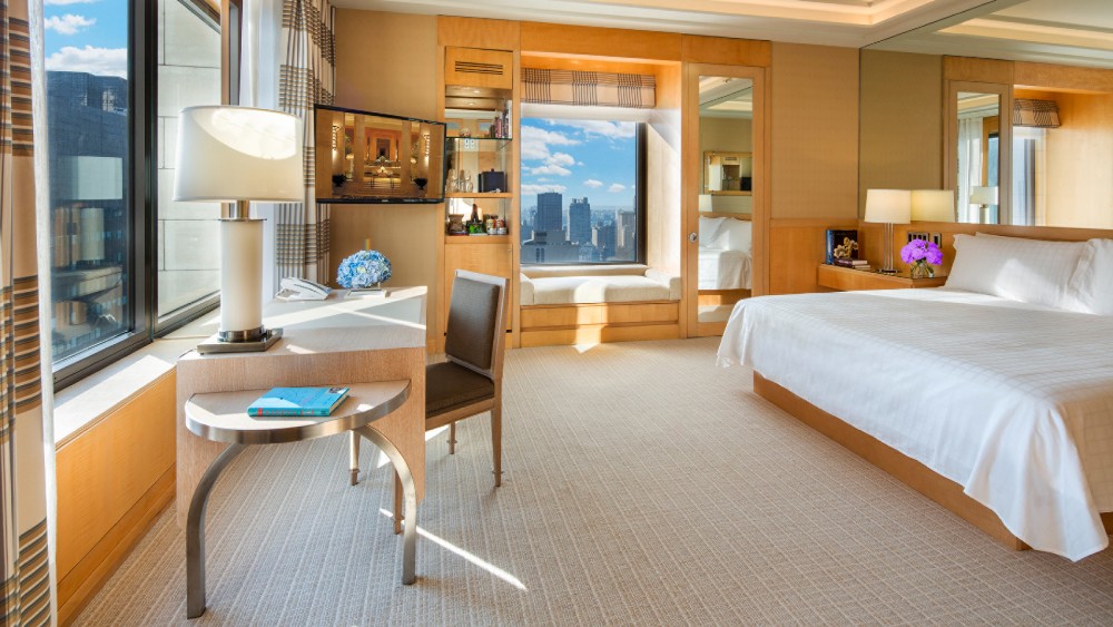 Bedroom of a suite at Four Seasons Hotel New York