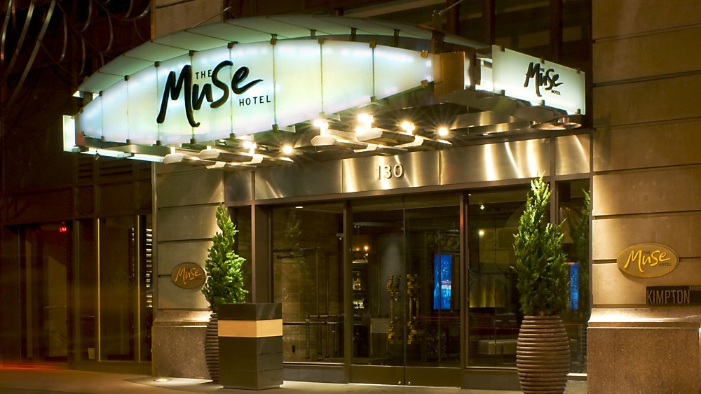 Entrance to the Kimpton Muse Hotel at night