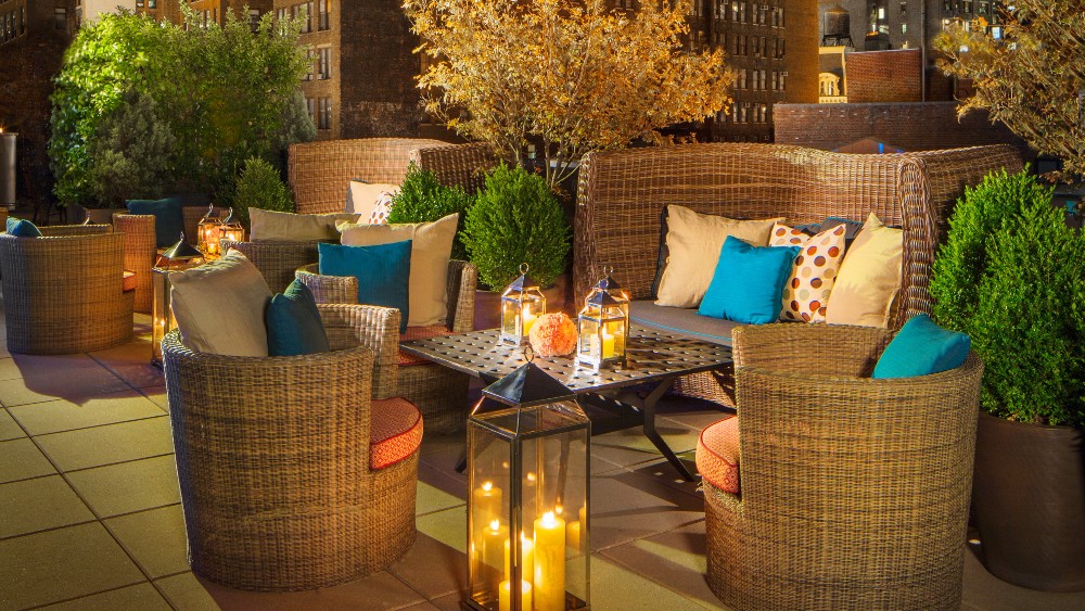 Outdoor seating on the veranda at Kimpton Hotel Eventi
