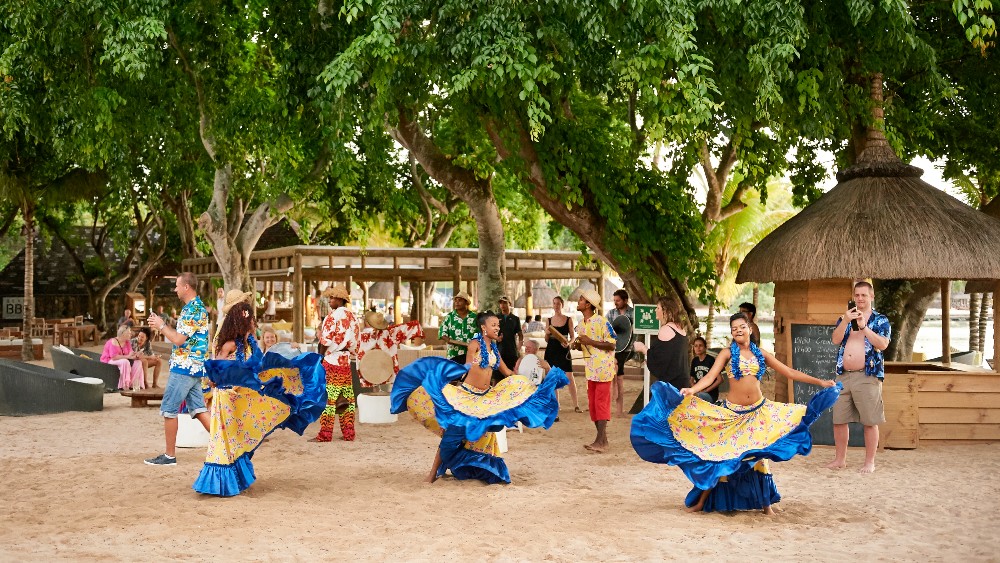Women performing a cultural show at The Ravenala Attitude