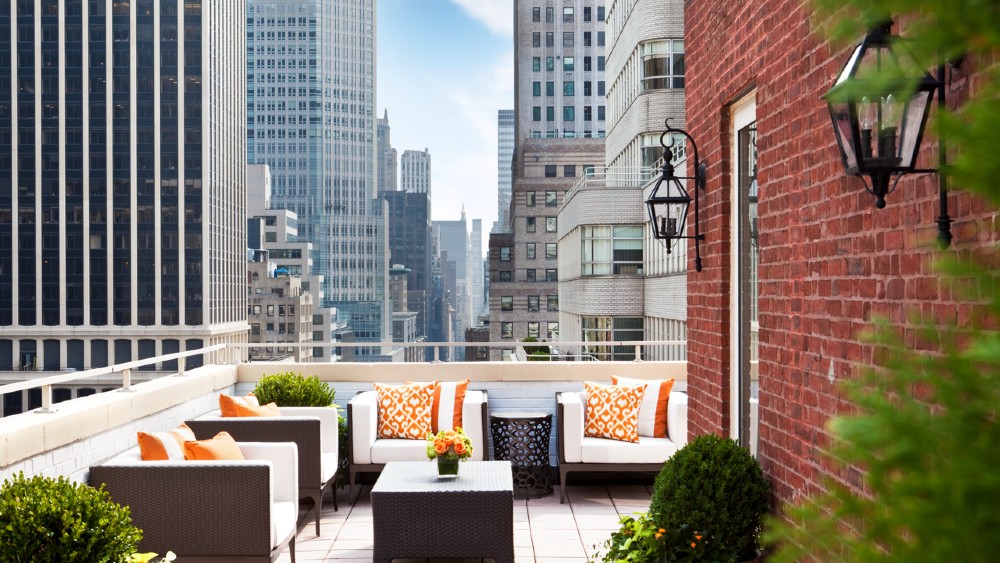 Furnished terrace with views of New York from Omni Berkshire Place